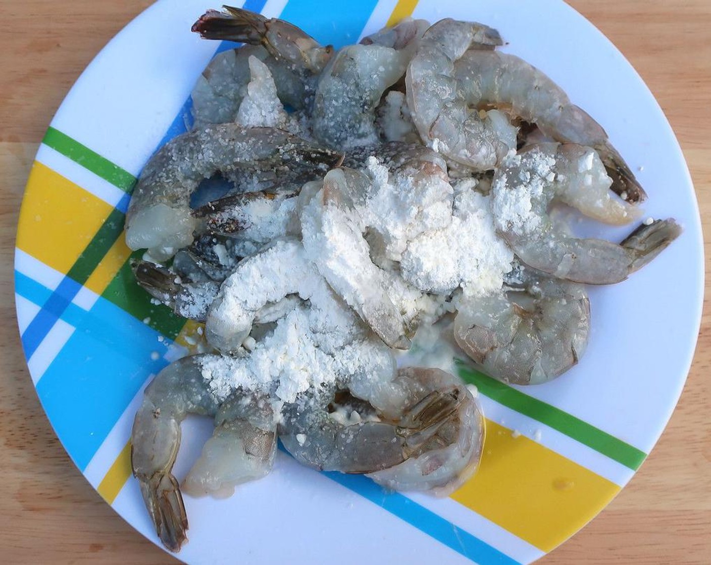 step 3 Dust Shrimp (1 lb) with Corn Starch (1 Tbsp), season with Kosher Salt (to taste), Lemon Juice (to taste) and Garlic Paste (to taste).