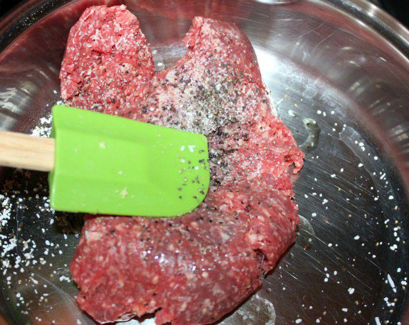 step 1 In a medium-large pan, cook up the Lean Ground Beef (1 lb) with some Salt (to taste) and Ground Black Pepper (to taste).