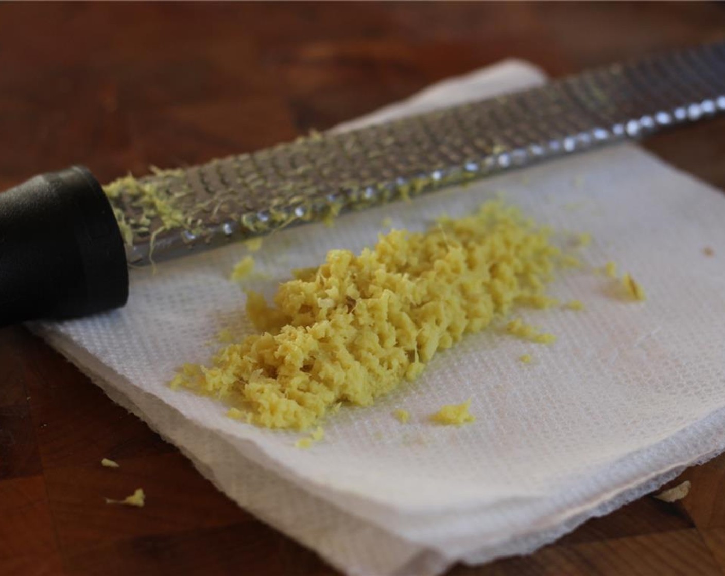 step 3 Grate the 2-inch piece of ginger onto a paper towel.