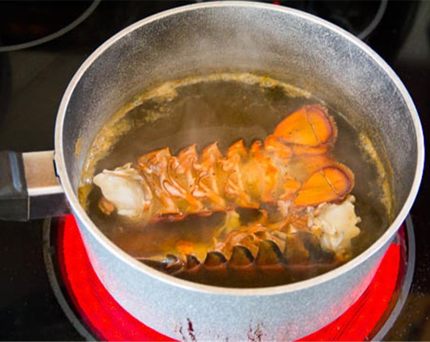 step 2 Take the lobster tails out of the water and remove the meat. Finely chop the lobster meat.