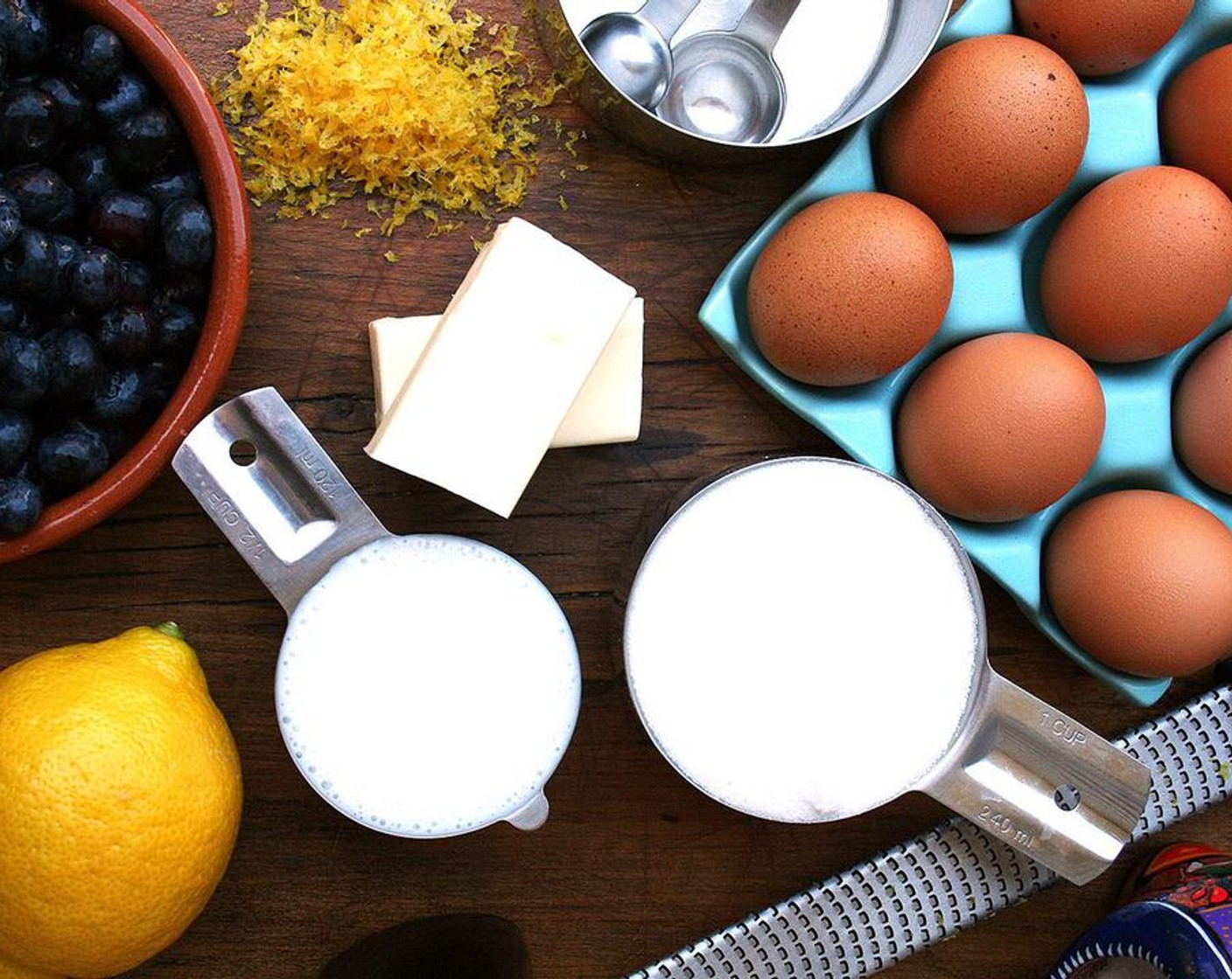 step 2 Using a stand mixer or hand-held mixer, cream the Unsalted Butter (1/2 cup) with the zest of the Lemon (1) and Granulated Sugar (1 cup) until light and fluffy.