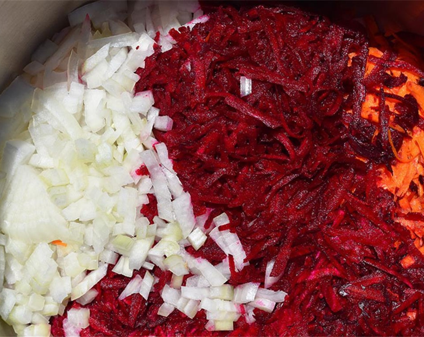 step 2 Place beet, carrot, and chopped Onion (1) in a large pot with Chicken Broth (6 cups). Bring to a boil and then reduce to a simmer. Cook for 20 minutes.