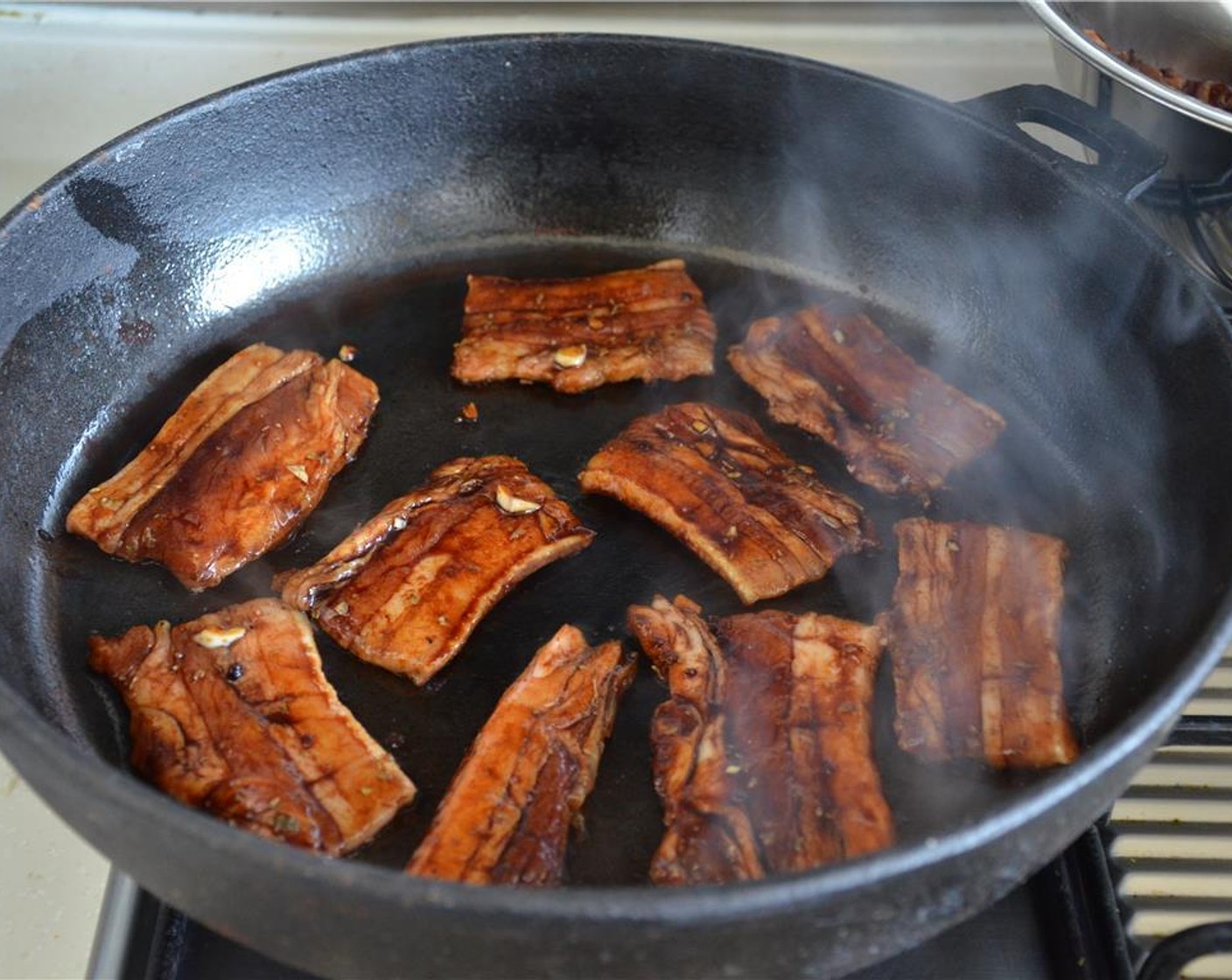 step 10 Grill the marinated pork belly on the hot skillet, flipping only when you see some char. When both sides are done, set aside.