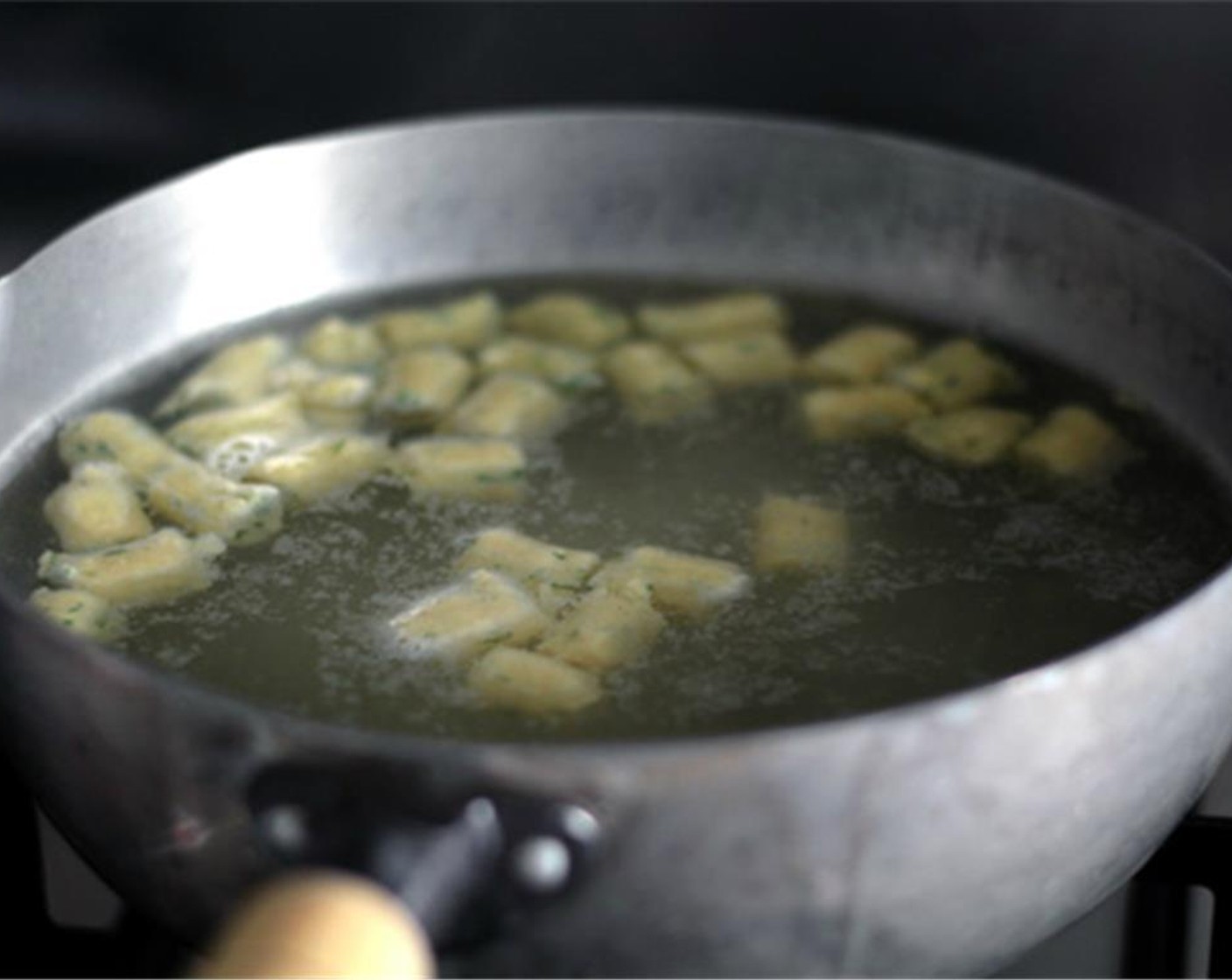 step 12 Poach the gnocchi for another 1 - 2 min after they’ve floated to the surface of the water, remove with a slotted spoon and do the next batch.