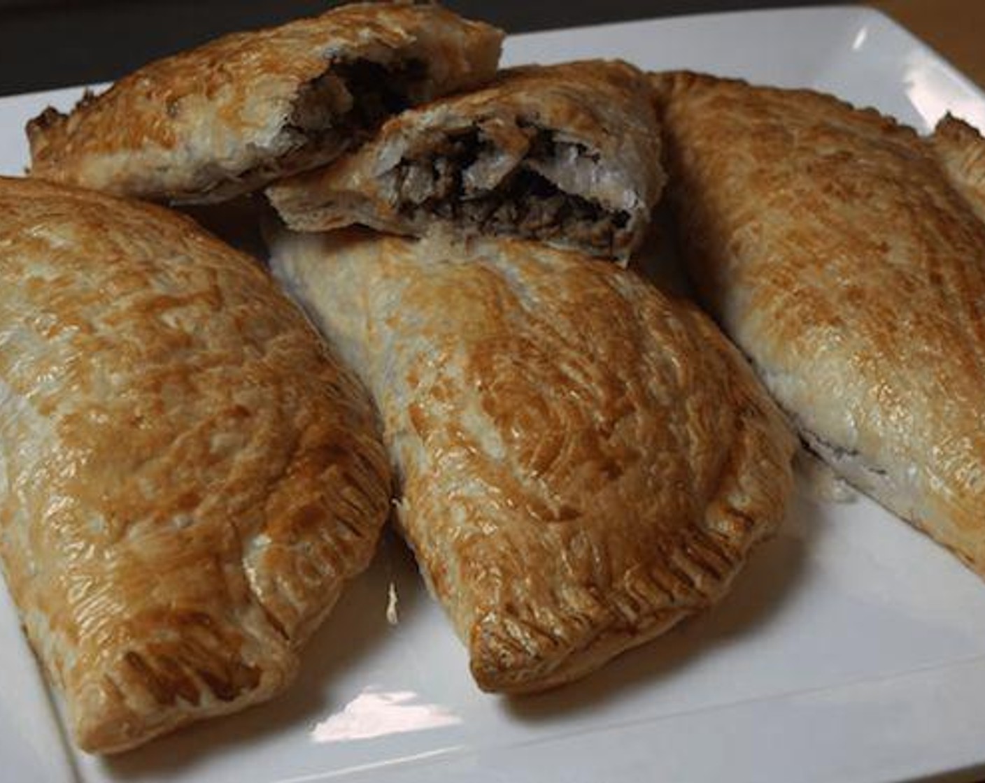 step 7 Place tray into preheated oven at 430 degrees F (220 degrees C) for about 25-30 minutes or until pastry is golden and puffed up. Once they are golden and puffed take them out and let them cool for about 5 minutes. Enjoy!