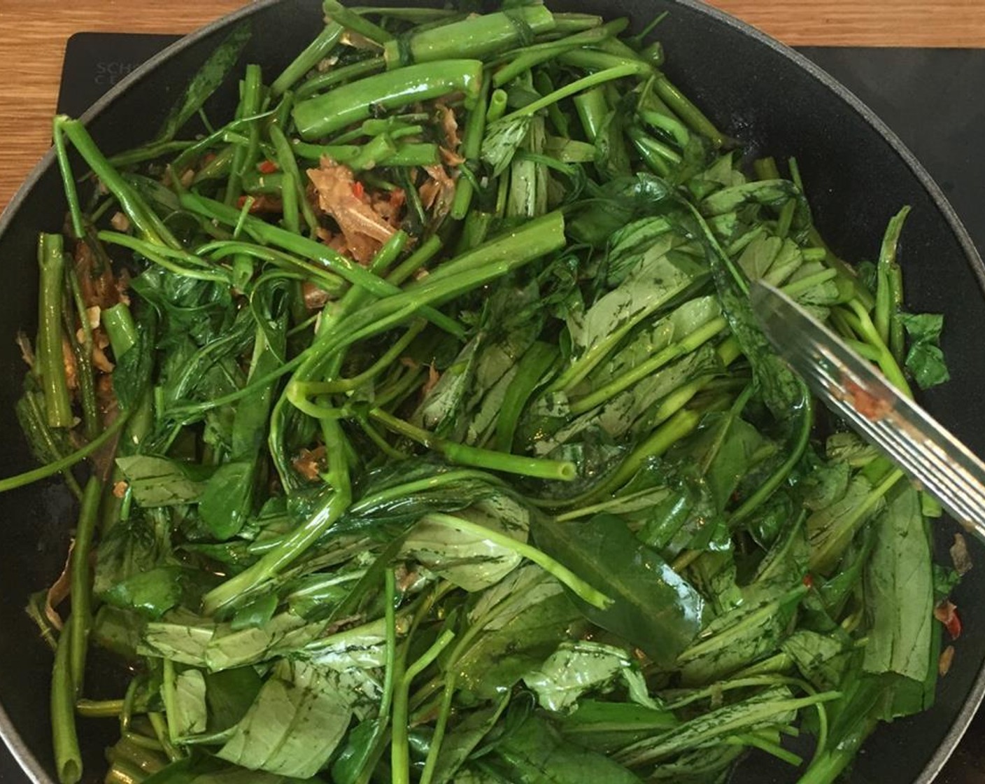 step 7 Add leaves and Soy Sauce (1 tsp).