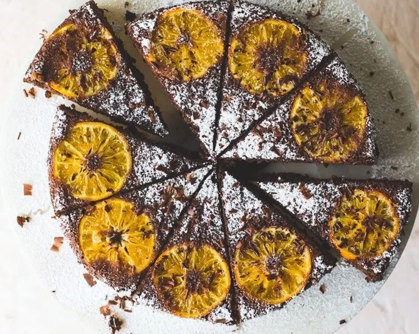 step 8 Sprinkle with Powdered Confectioners Sugar and Chocolate Shavings, if desired. Great job! Thanks to your outstanding baking skills and with a little help from your oven, the delicious cake is now ready.