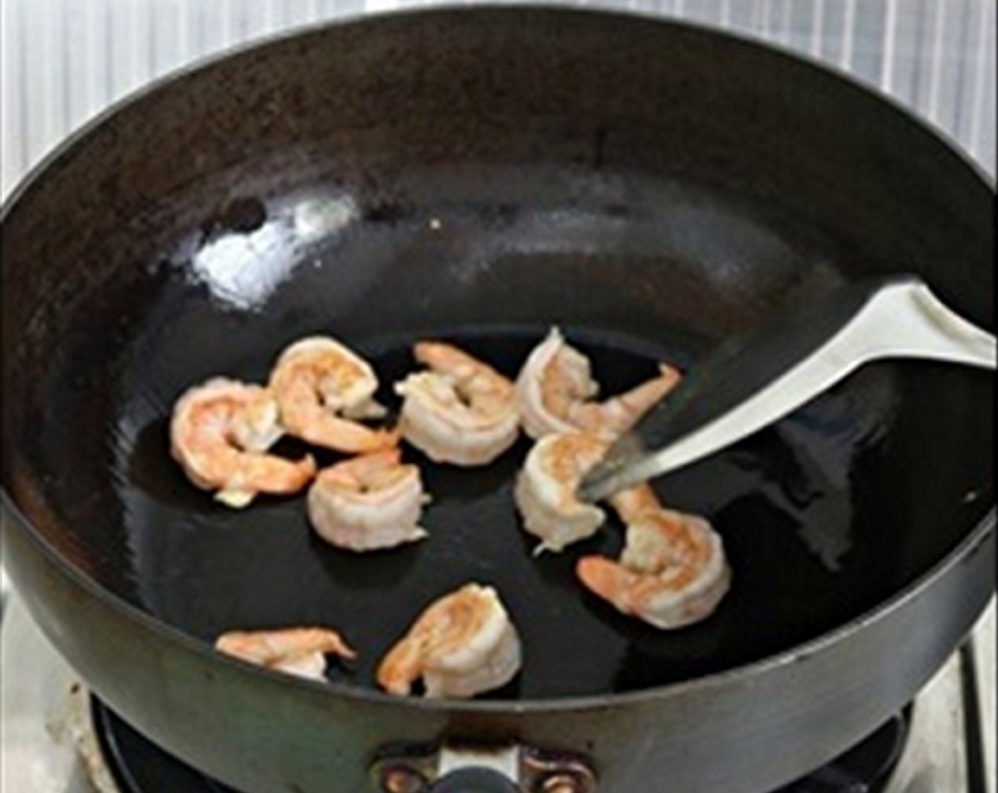 step 2 Add little oil to the same frying pan and fry Prawns (10) to almost cooked, dish up and set aside.