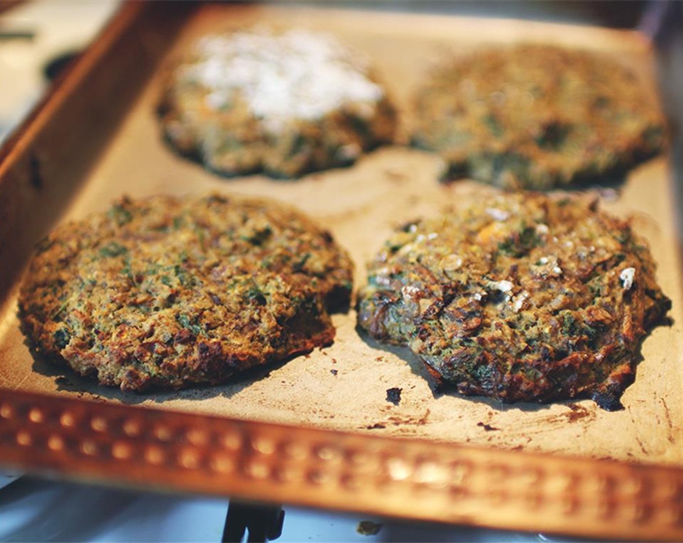 step 5 Remove patty mixture from refrigerator and prepare a cutting board with flour. With floured hands, mold mixture into large patties. Place on oiled baking tray and cook in oven until tops are golden brown.