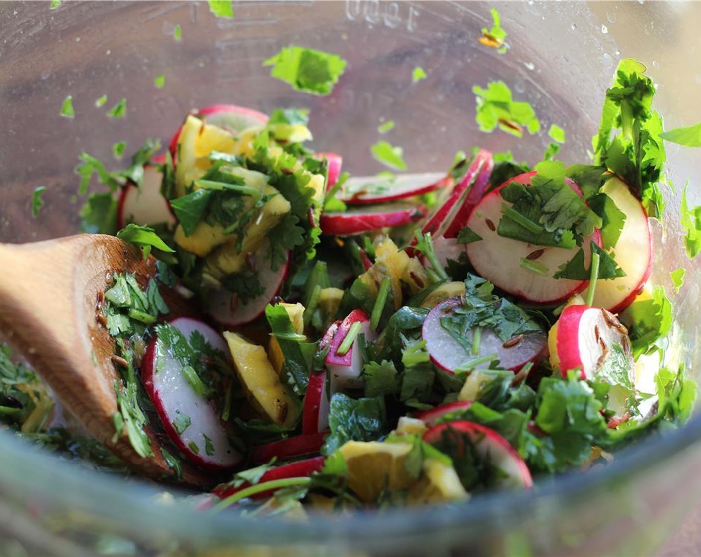 step 16 Combine the orange segments, radishes, cilantro, and sliced red onion in a bowl. When you're ready to serve the bites, toss with the dressing.