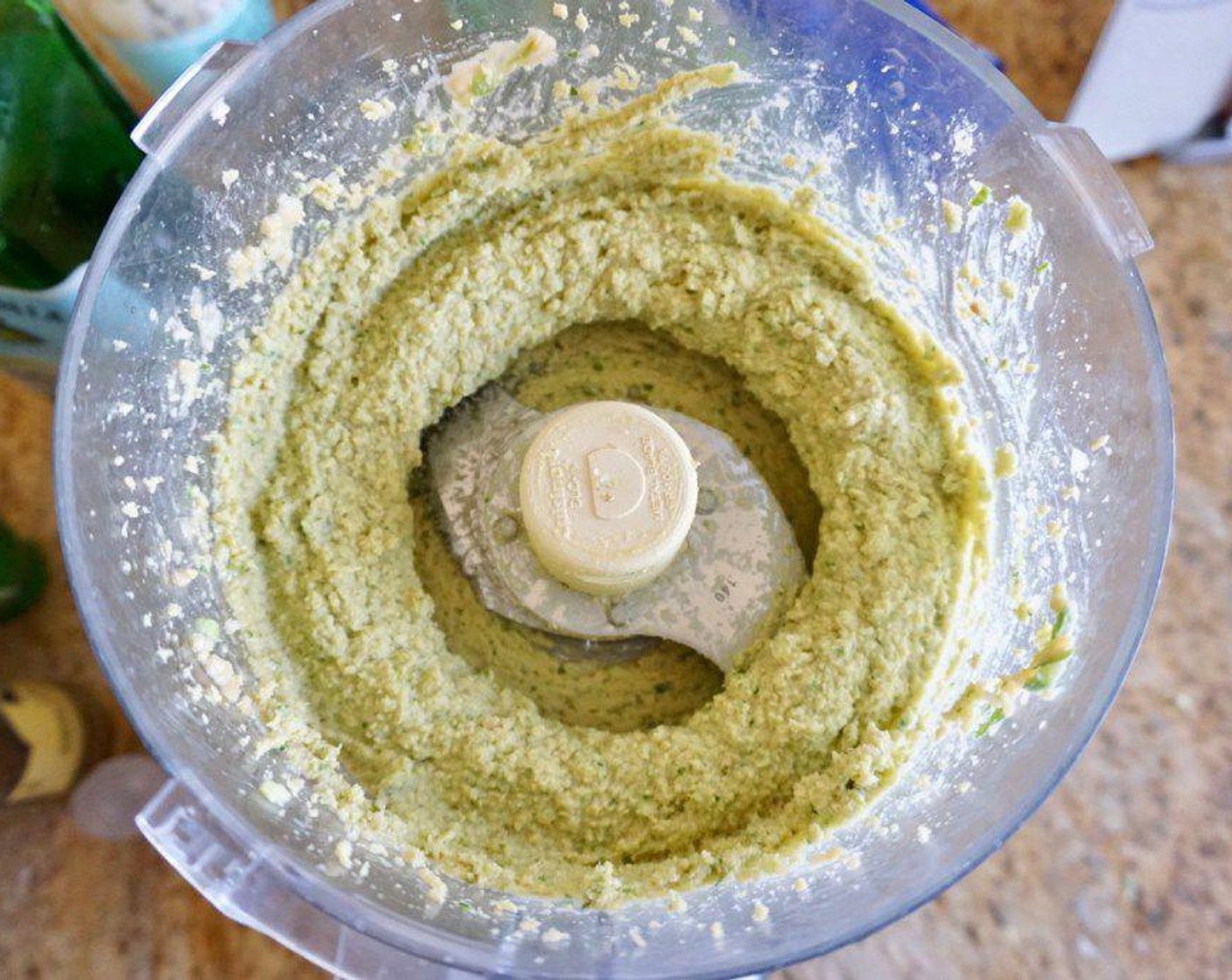 step 2 Slowly stream in the Olive Oil (3 Tbsp) and process until smooth. Add the Ground Cumin (1 tsp), Salt (1 tsp) and Garlic Salt (1 tsp) and pulse a few more times to fully combine. Add extra seasonings to taste if necessary.