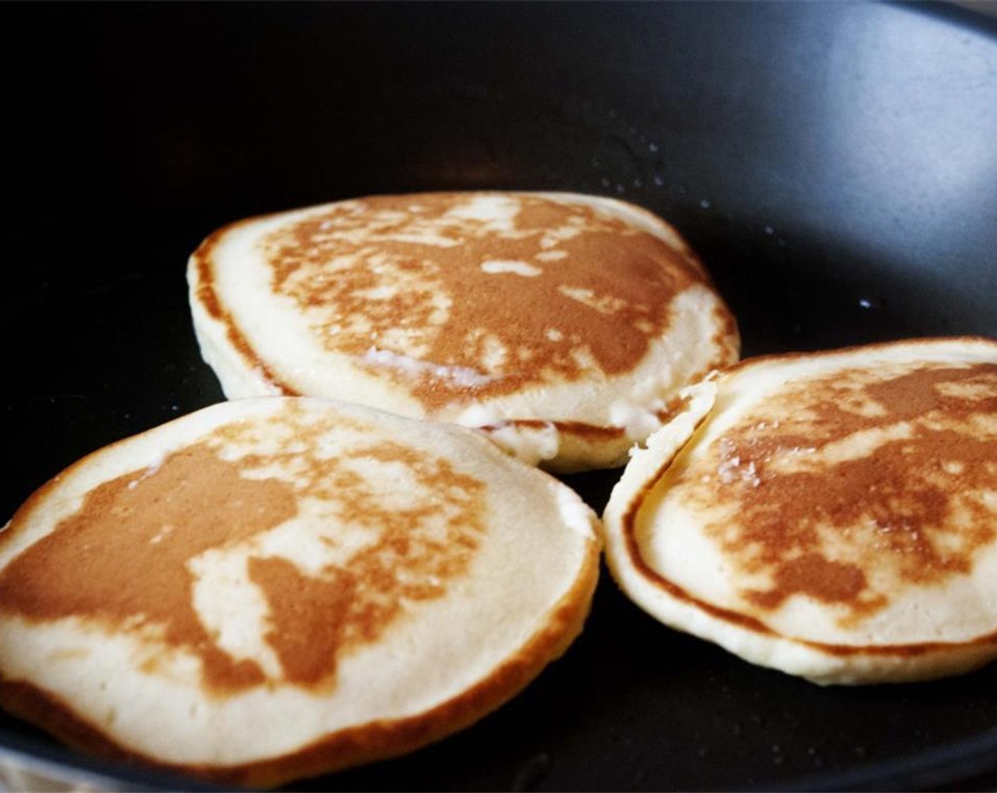 step 6 Flip the pancakes and cook for another 2 minutes. Transfer pancakes to a plate and continue cooking pancakes until all the batter has been used.