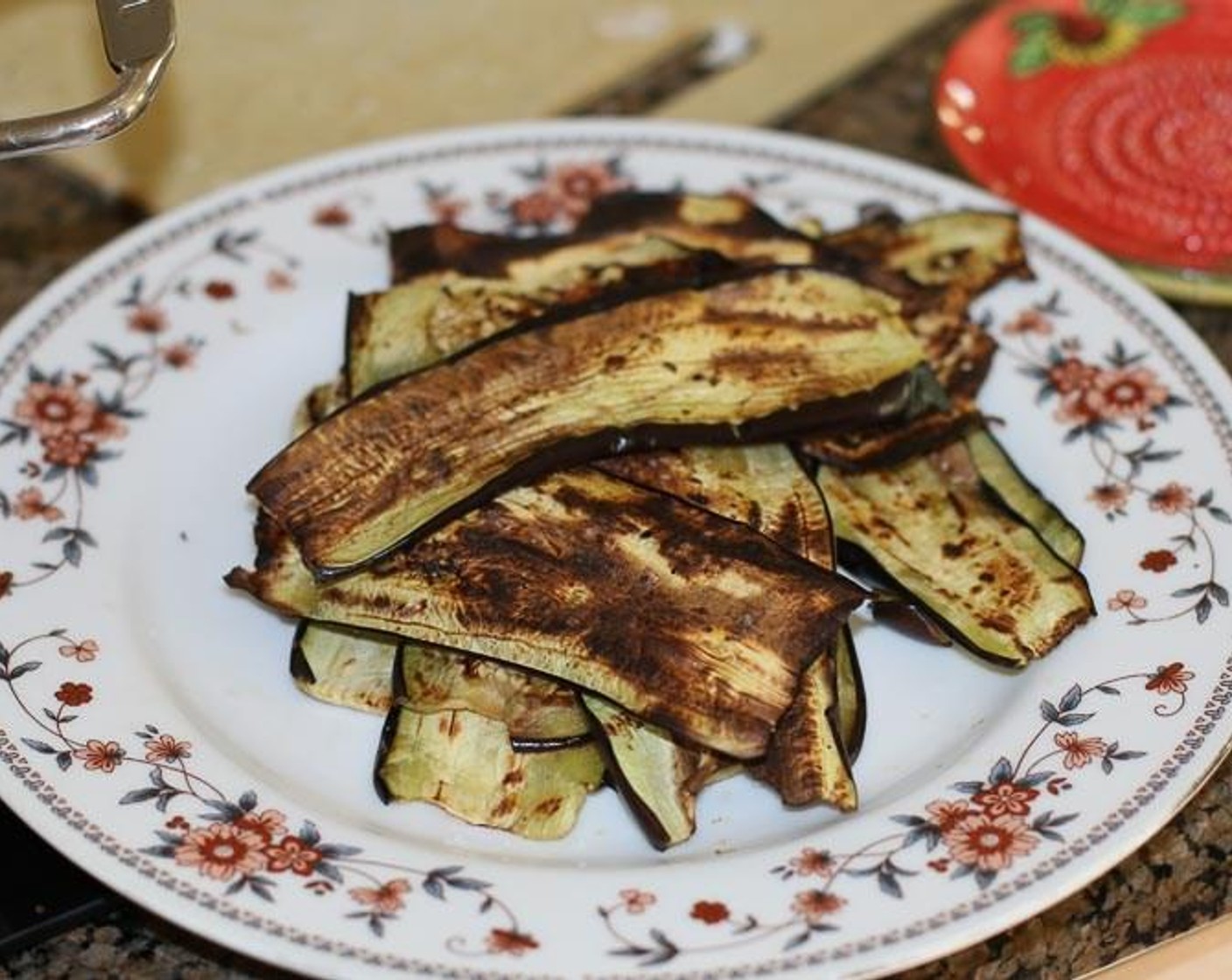 step 4 While it is simmering, sauté eggplant in Olive Oil (1 tsp) on each side until browned in a nonstick pan.