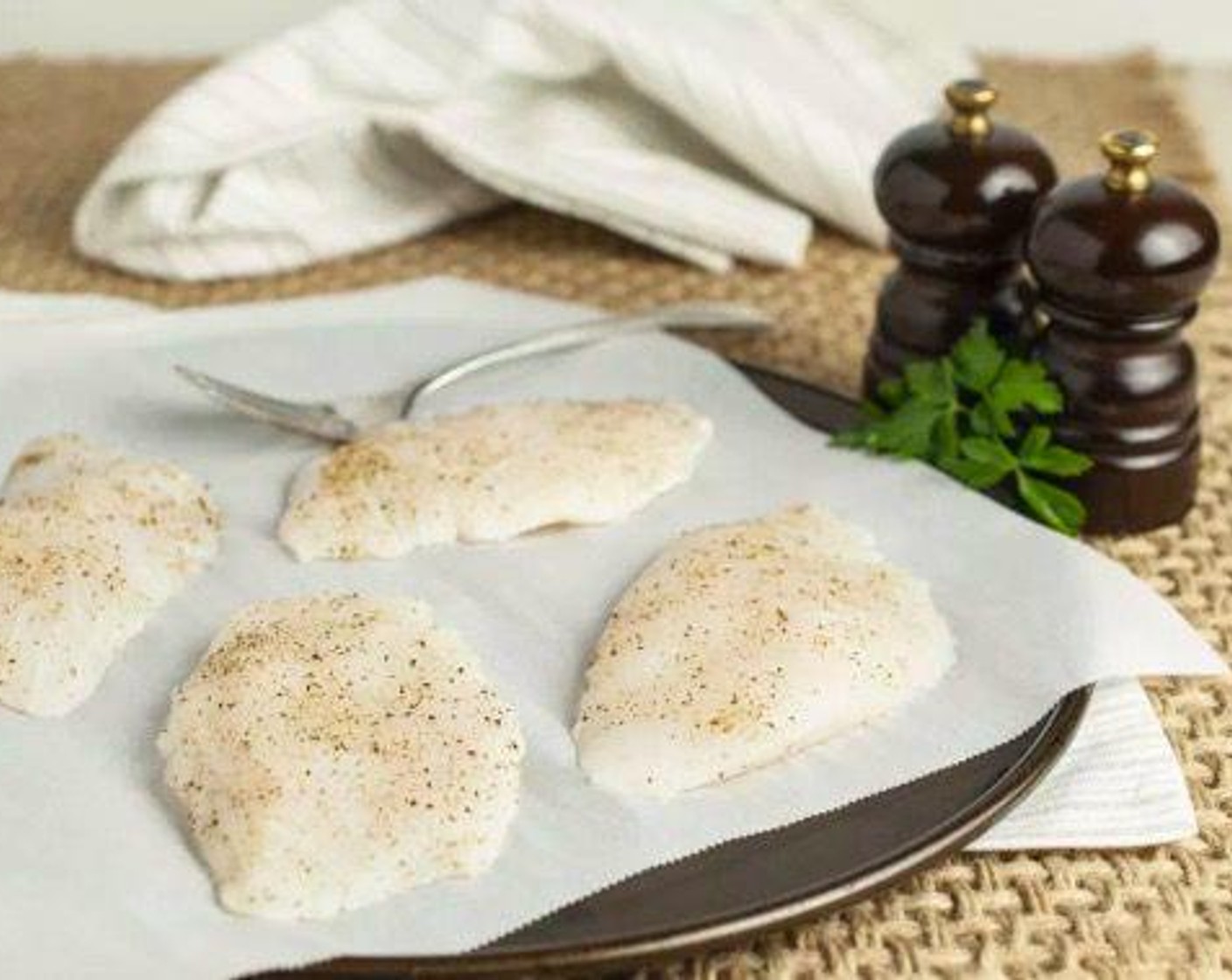 step 1 Pat Halibut Fillets (4) dry with a paper towel and season generously with Salt (to taste) and Ground Black Pepper (to taste) on both sides.