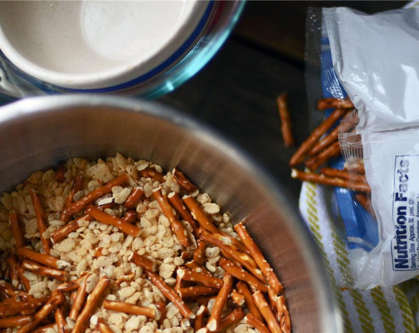 step 2 In a large mixing bowl, toss together Rice Cereal (5 cups) and Pretzel Sticks (3 cups). Set aside.