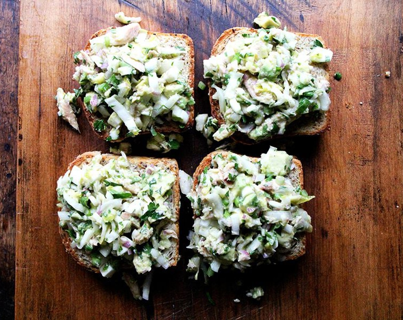 step 13 Transfer toasts to a platter. Mound trout and avocado salad over top. Serve immediately.