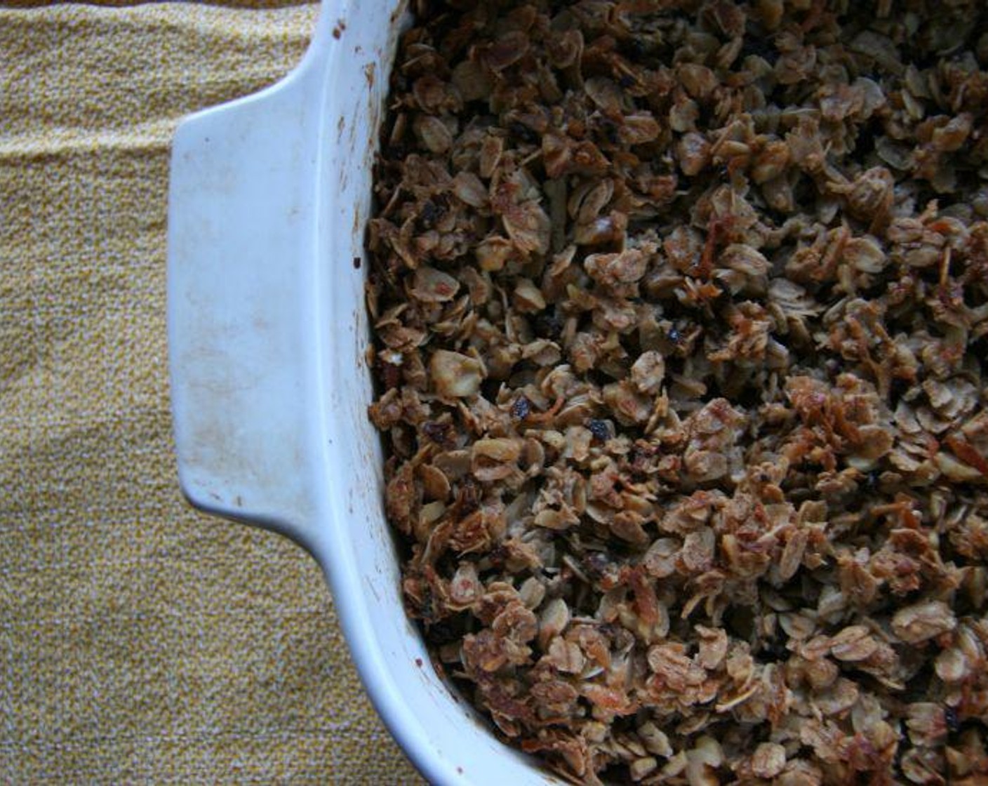 step 4 Pour into the greased dish and bake for 20 to 30 minutes, stirring half way through. The granola will turn golden brown and become very fragrant. Serve and enjoy!