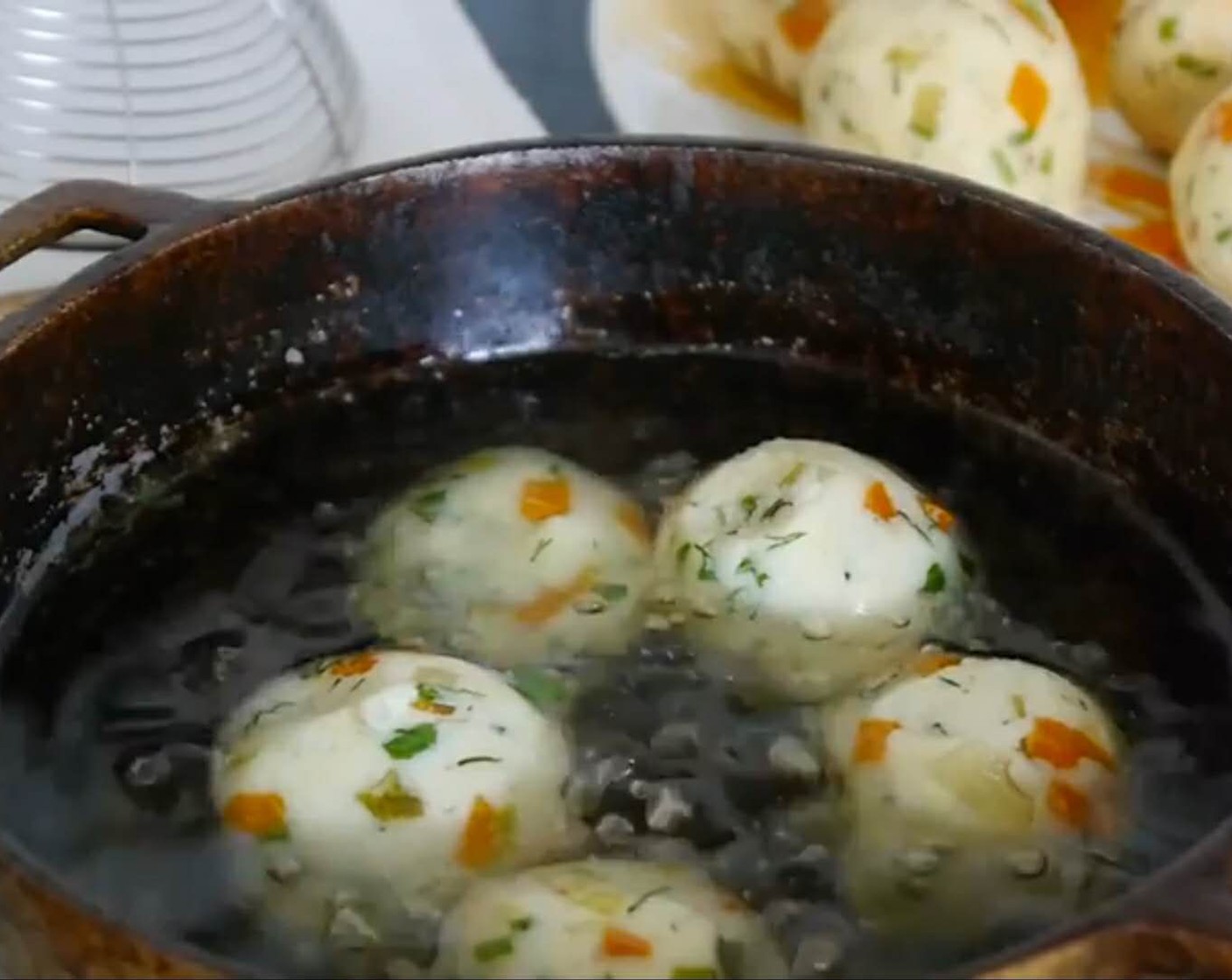 step 7 Once all the dough is used, heat more vegetable oil in a deep frying pan or in a deep fat fryer.