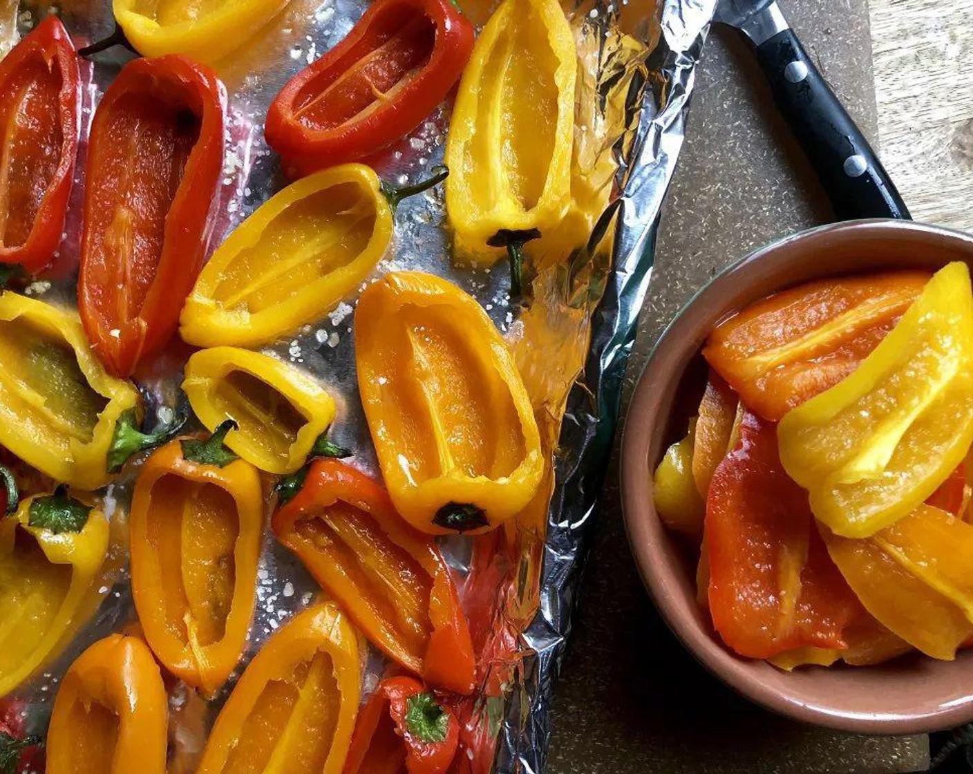 step 5 Cut and remove the top third of each pepper from stem end to tip. Reserve the cut-off piece for another use. Scoop out the membranes and seeds, and discard. Drain off any excess moisture.