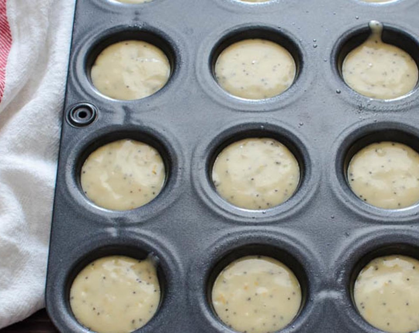 step 4 Spoon the batter into the muffin cups and bake for 11-13 minutes, or until golden brown on top.