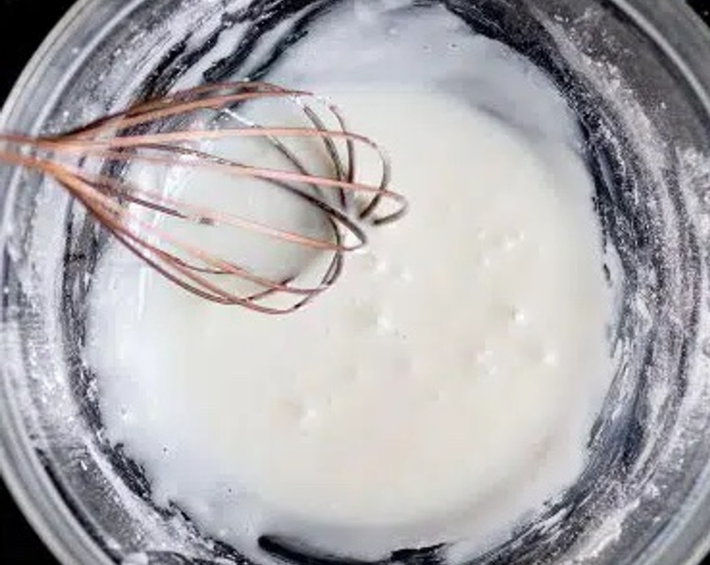 step 1 Whisk together Powdered Confectioners Sugar (1 cup) and Non-Dairy Milk (1 Tbsp) in a mixing bowl until smooth. The mixture should form a thick paste.