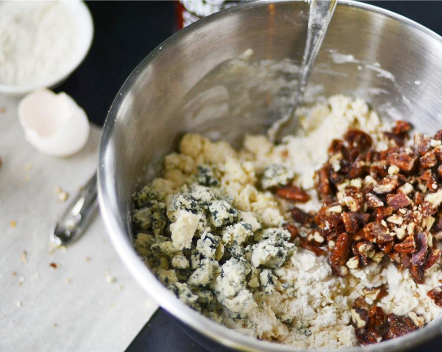 step 6 Fold in blue cheese and chopped pecans.