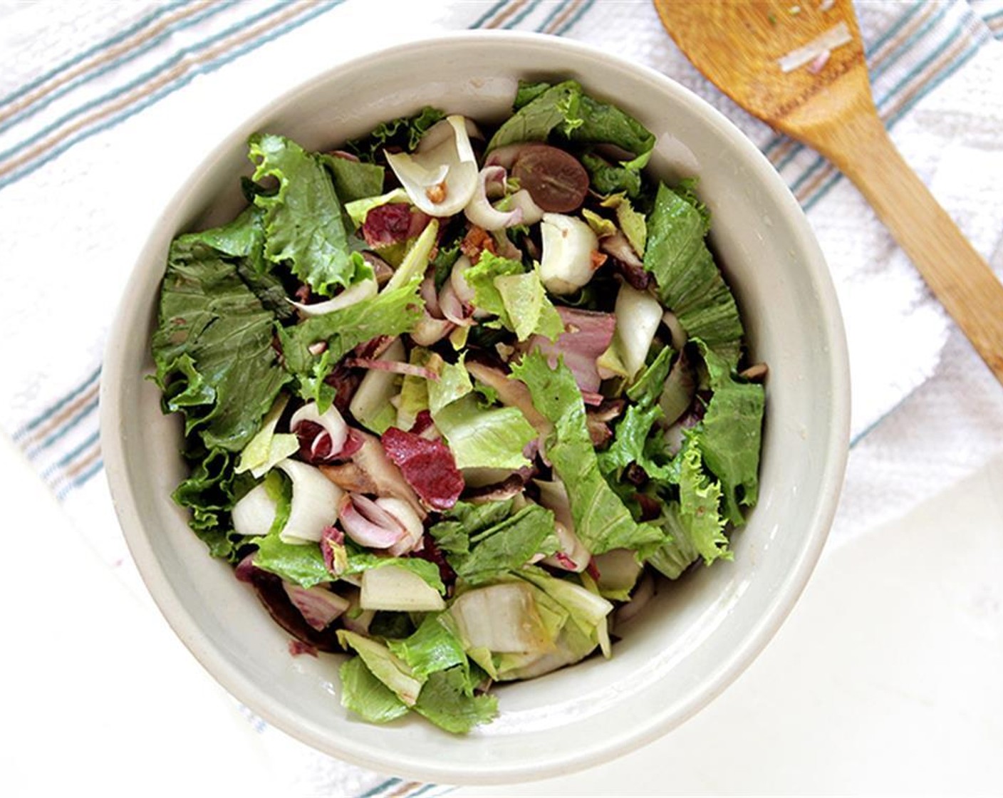 step 10 Roughly chop the pecans and place in a mixing bowl, add mixed lettuces and Red Seedless Grapes (1/2 cup). Once the toasted bread is ready, add the shiitakes and the dressing to the bowl and gently mix to combine. Season with Kosher Salt (to taste) and Ground Black Pepper (to taste).