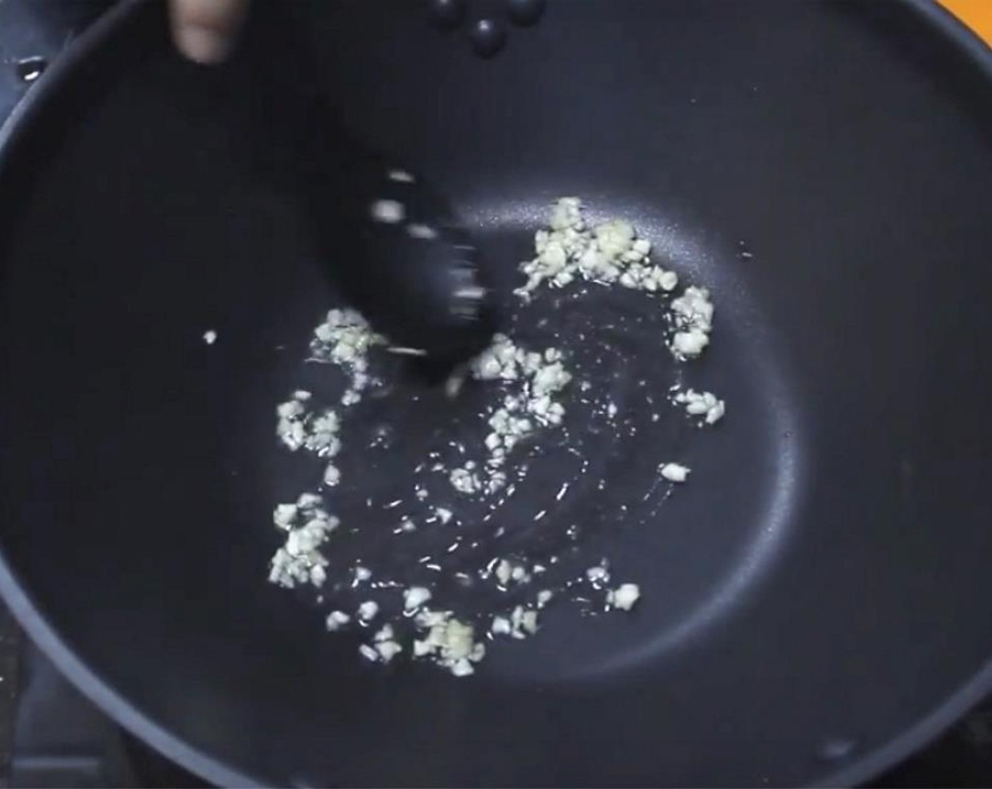 step 7 In your saucepan, heat up oil over medium-high heat. Saute Garlic (2 cloves) until aromatic.