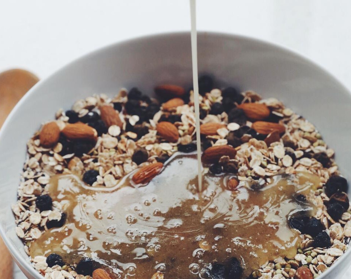 step 3 Melt Raw Honey (1/2 cup), Coconut Oil (1 cup), Vanilla Extract (2 tsp), and Sea Salt (1/4 tsp) in a sauce pan over low heat until melted about 4 to 5 minutes, Pour warm mixture over the dry ingredients.