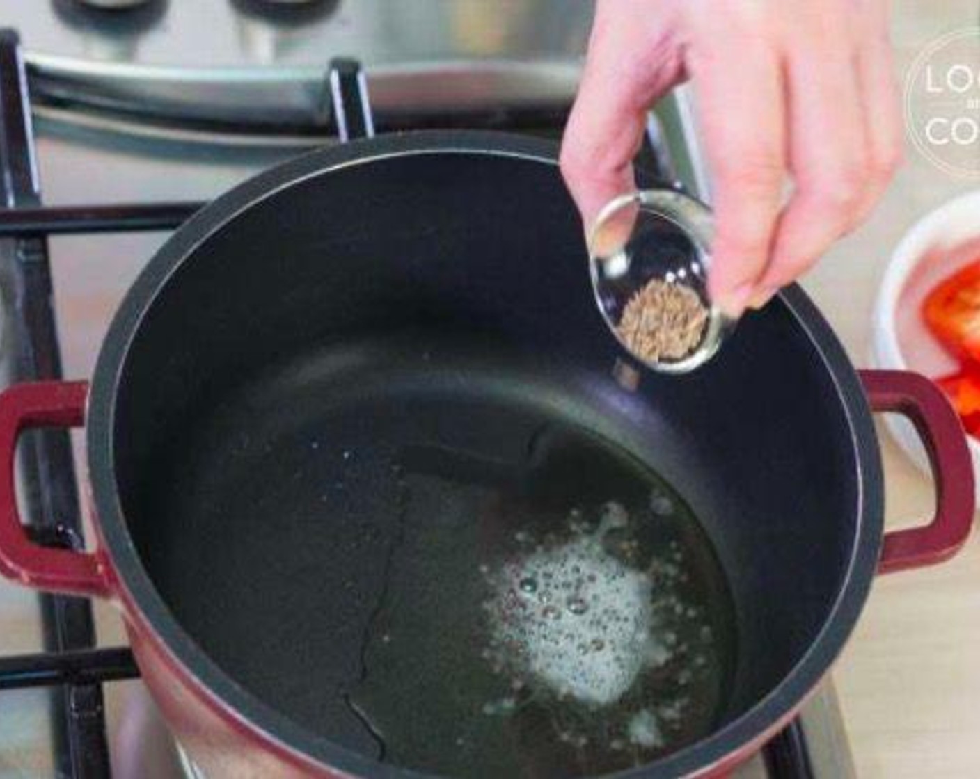 step 3 When they pop, immediately add Cumin Seeds (1/4 tsp).