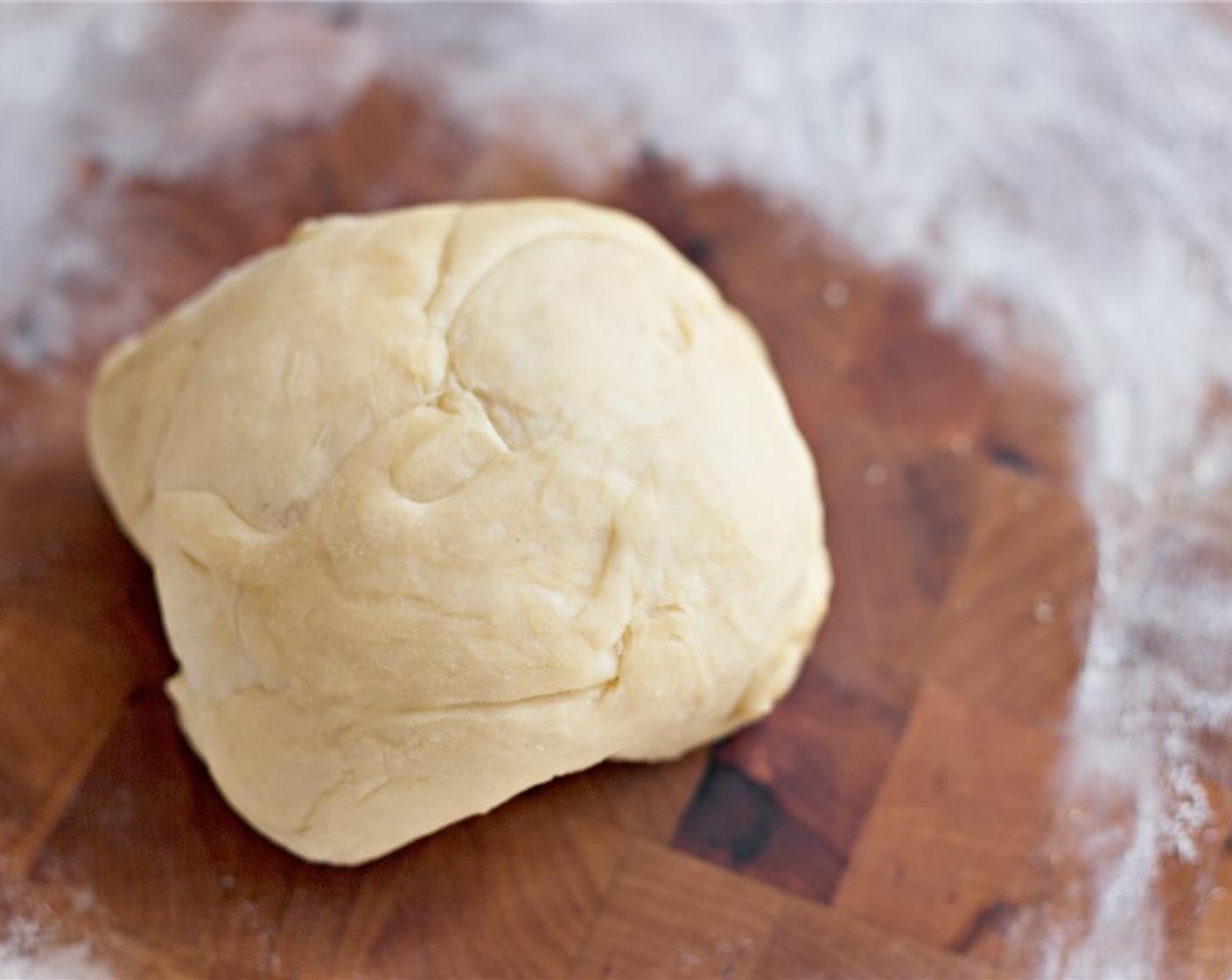 step 4 Place the dough in a lightly oiled bowl covered with a moist towel or plastic wrap for 1 or 2 hours.