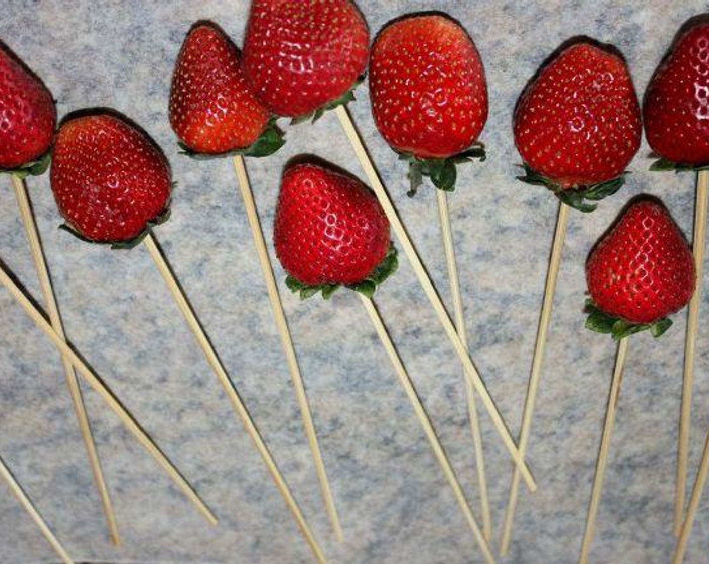 step 2 Insert a skewer into the stem end of each Fresh Strawberries (12), making sure it’s in there nice and snug…