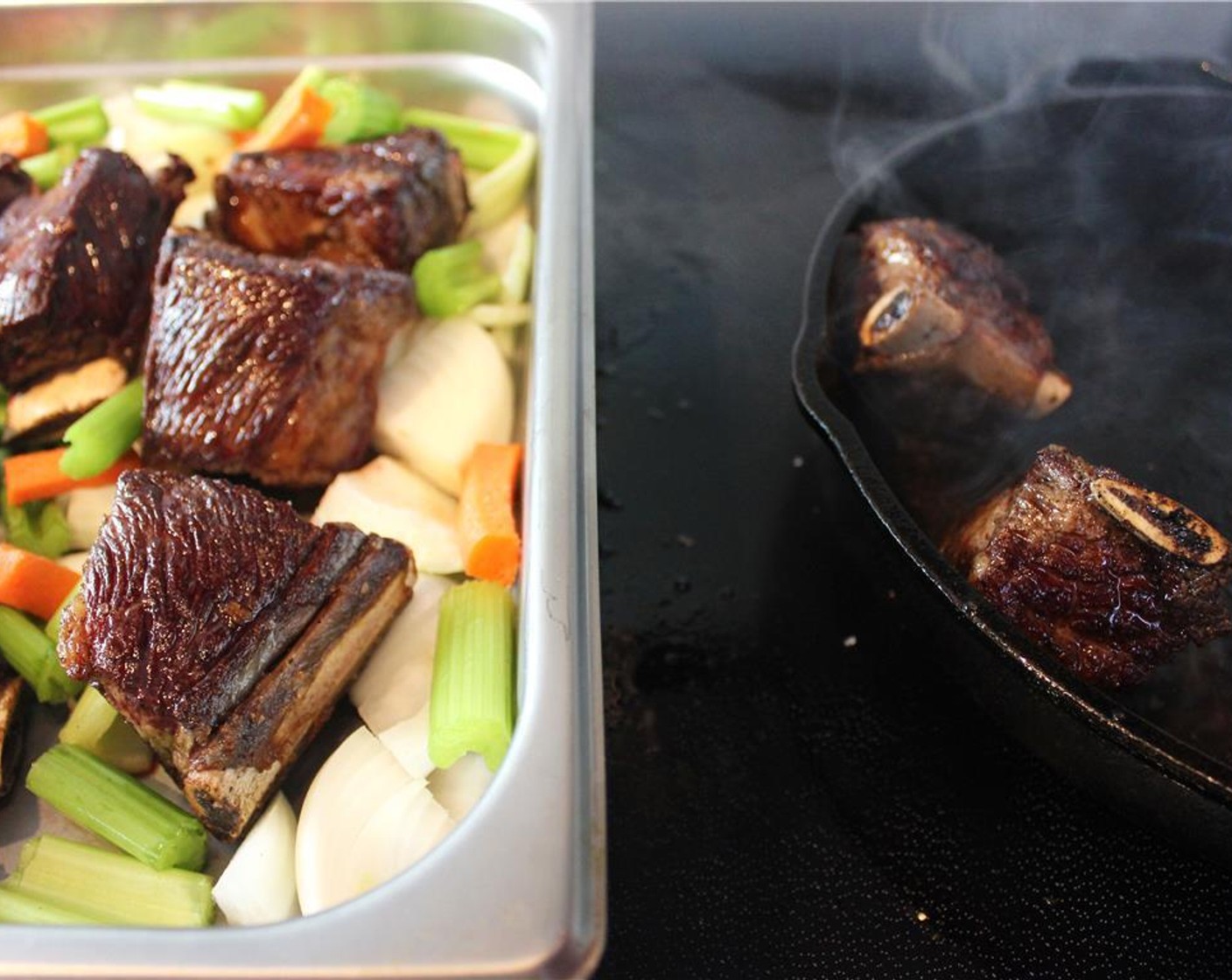 step 3 Place the seared short ribs in the pan with the mirepoix when ready. Sear each side of the rib in the pan until deep color develops.