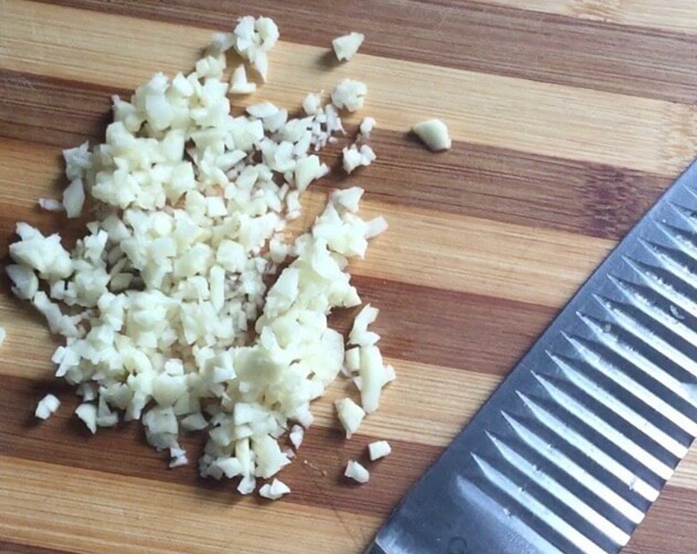 step 25 Peel and chop Garlic (1 clove). And we're ready to fry the filling.