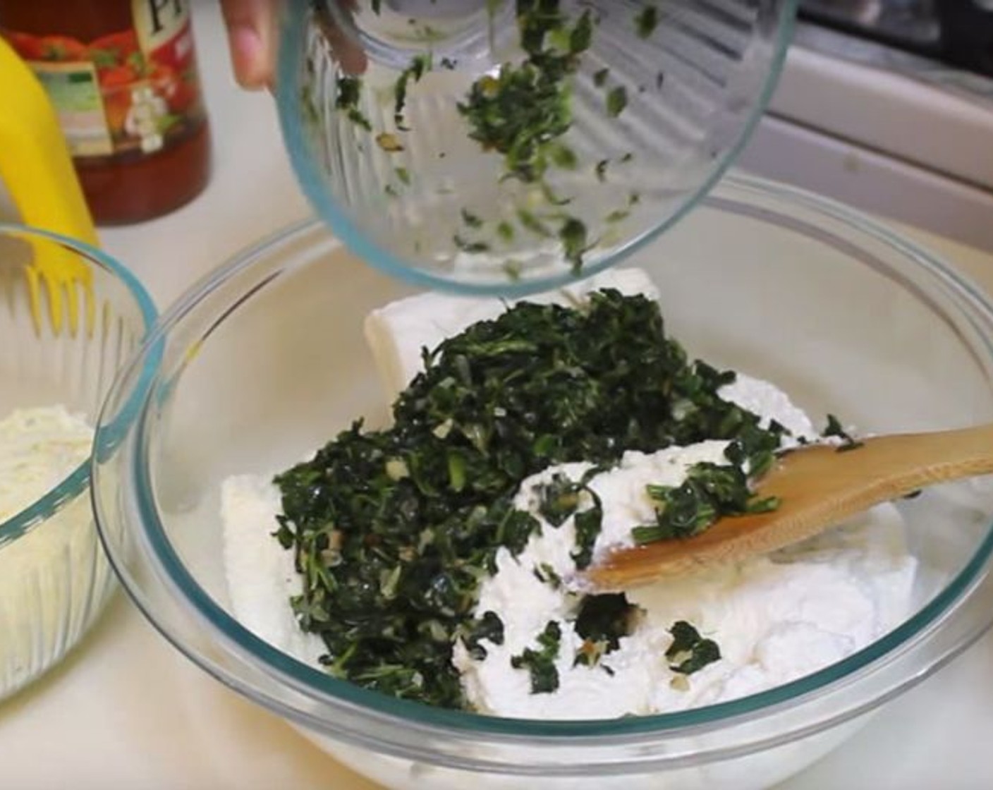 step 3 Mix Ricotta Cheese (2 cups), Cream Cheese (3/4 cup), Parmesan Cheese (1/2 cup) with the spinach. Add some Mozzarella Cheese (2 cups) until they are combined. Season with Salt (to taste) and Ground Black Pepper (to taste).