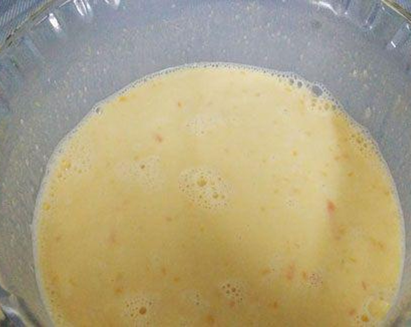 step 2 Boil the Whole Milk (720 mL) well and let it reduce. Once it cools a bit, add the carrot sweet corn paste, Sweetened Condensed Milk (375 g) and Vanilla Essence (2 dashes). Mix well.