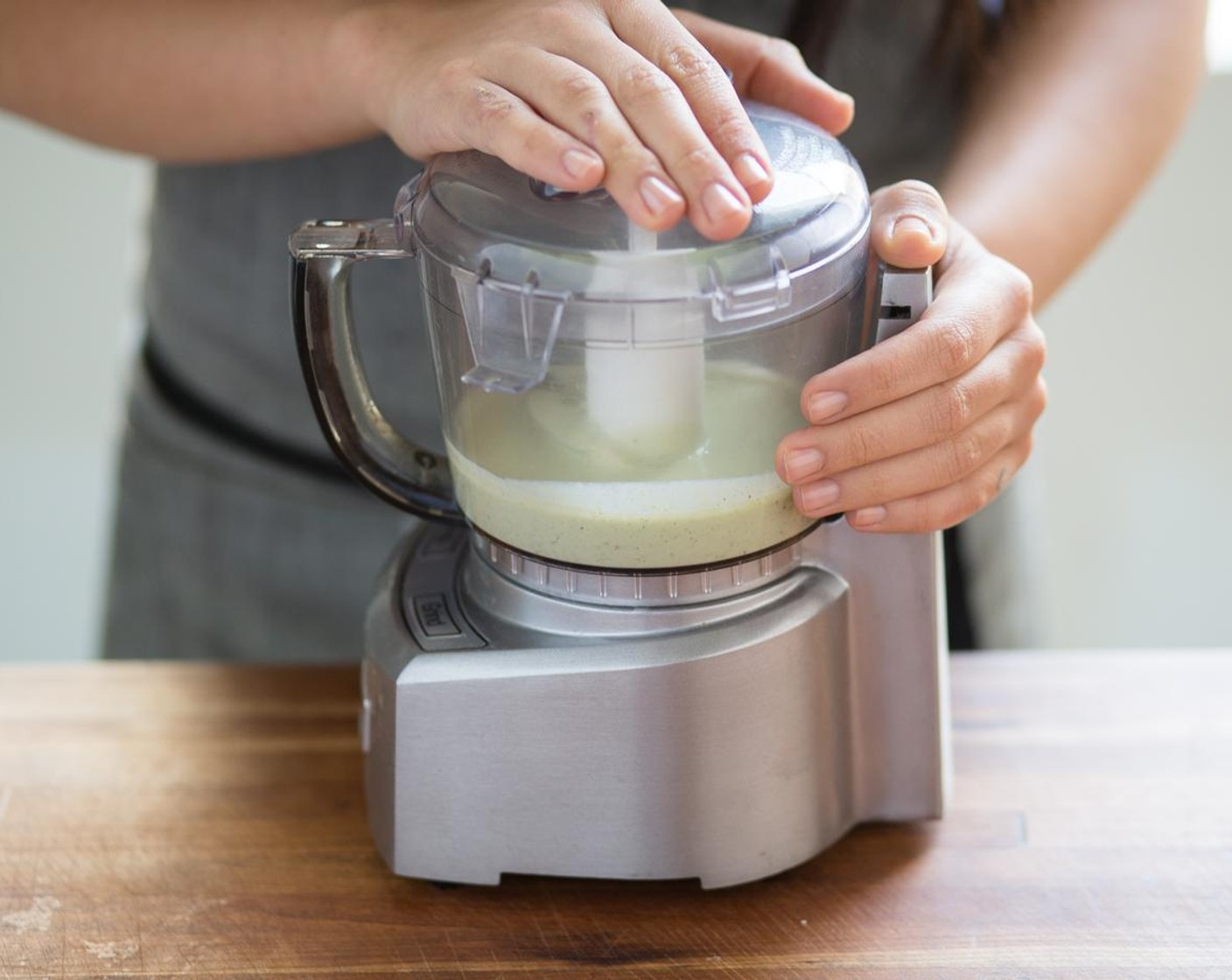 step 7 Remove the leaves from the Fresh Cilantro (1/2 cup) and discard stems. Rough chop the cilantro leaves and add to the food processor. Add the Greek Yogurt (1 cup), Honey (1 Tbsp), a pinch of Salt (to taste) and the remaining lime juice. Blend until well combined.