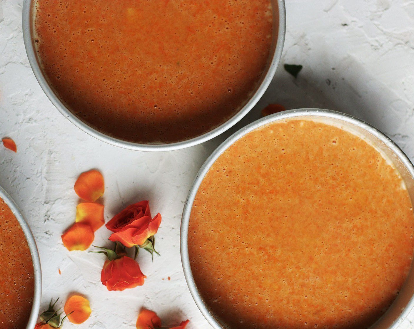 step 6 Mix together for one minute and pour the batter evenly into the prepared cake pans.