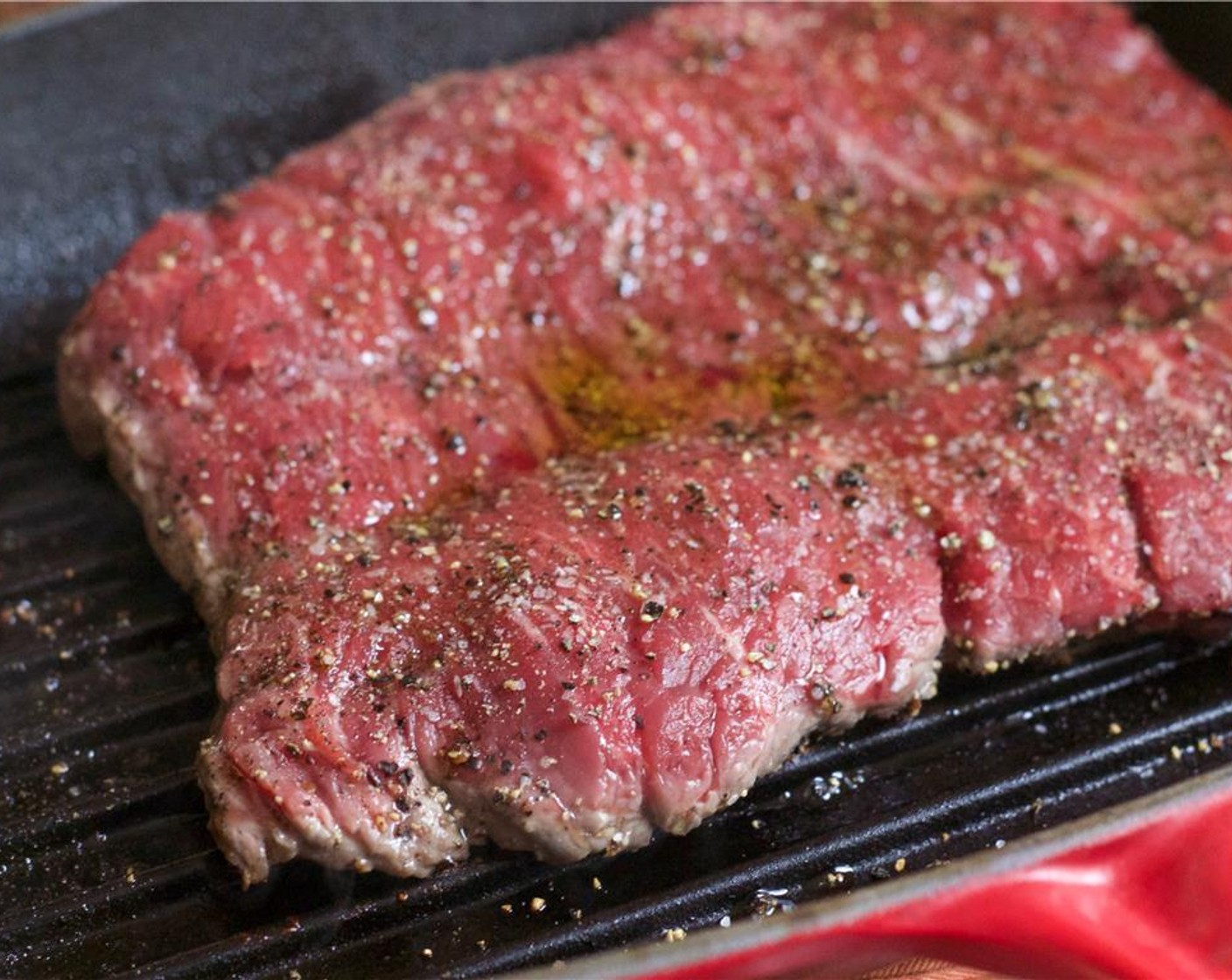 step 5 Sear the steak for 4 minutes per side. Remove from the pan when the internal temperature is 145 degrees F for medium rare.