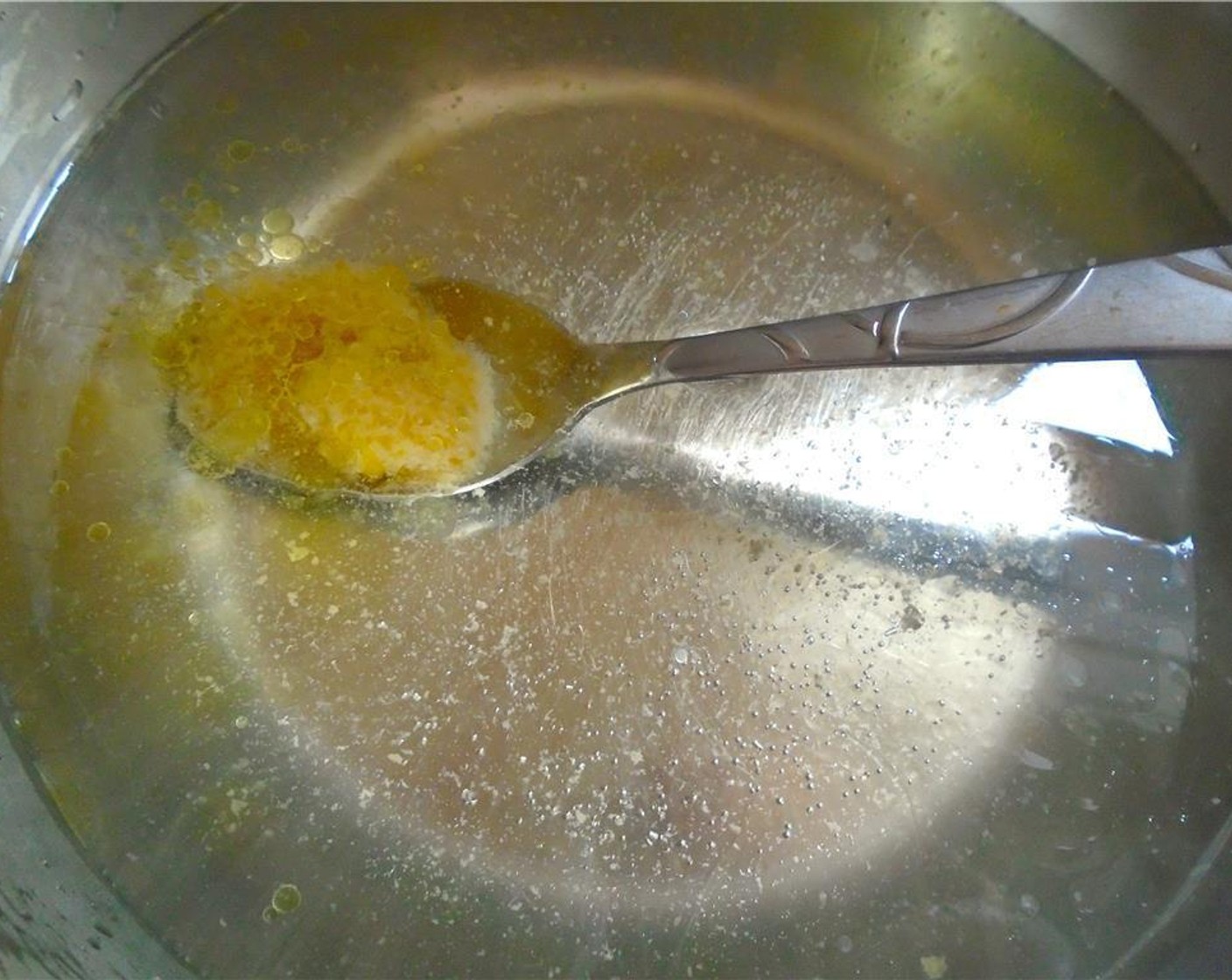 step 1 For the polenta, bring Water (6 cups), Garlic Paste (1 tsp), Salt (1 tsp), and Cayenne Pepper (1 tsp) to a simmer.