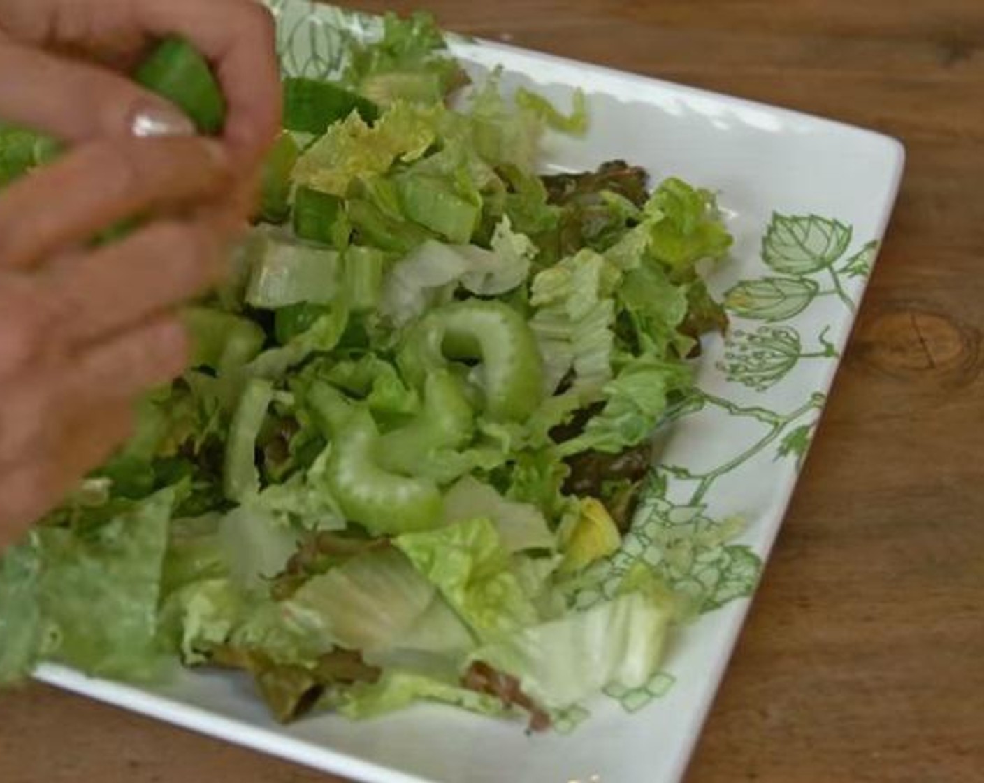 step 2 Fill a large salad bowl with torn Romaine Lettuce (to taste), Persian Cucumber (1), Scallion (1 bunch), Celery (1 stalk), and Chicken (1 cup). Add dressing and toss/mix well.