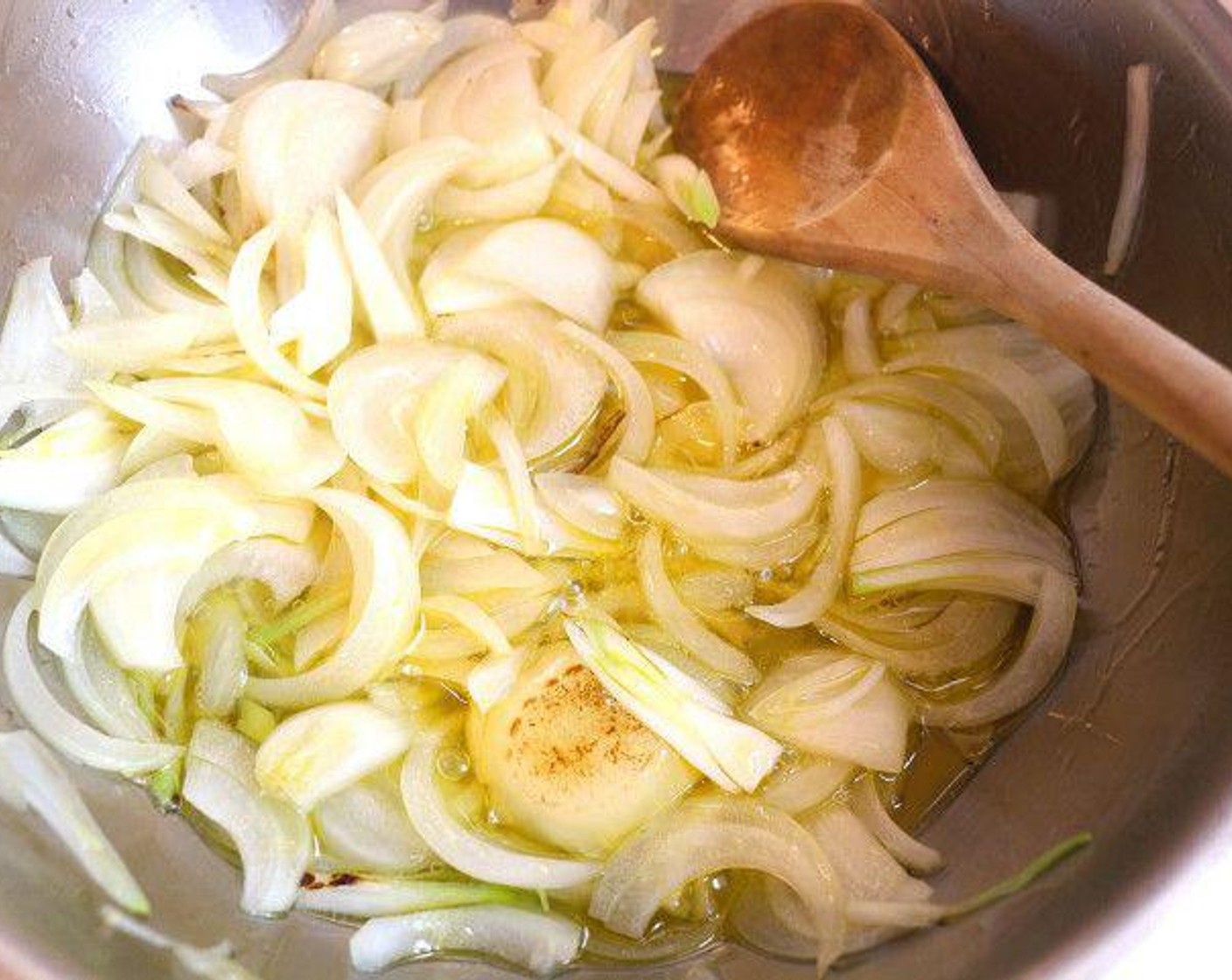 step 1 Sauté Onion (1) with Extra-Virgin Olive Oil (1 Tbsp) until transparent.