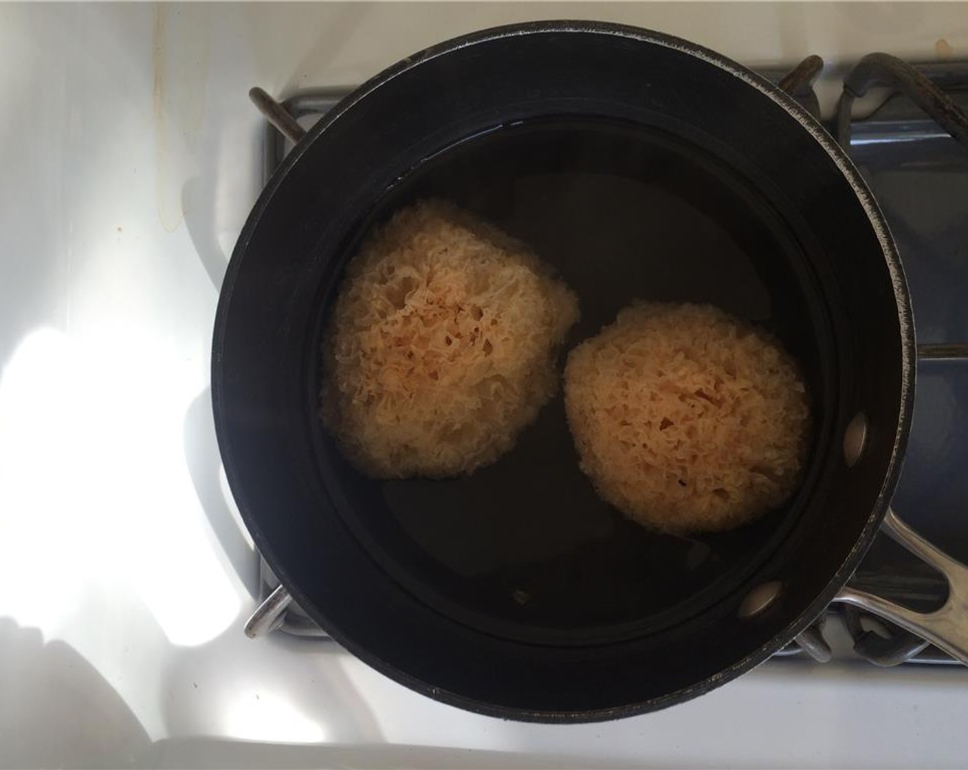 step 1 Prep the Tremella Mushroom (1/3 cup) by soaking it in a bowl of hot water. Cover for 30 minutes or until it becomes puffy and a lighter color.