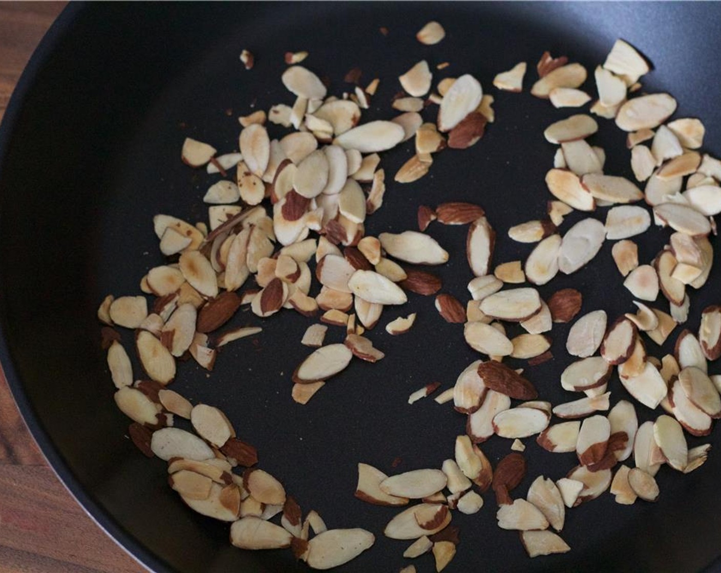 step 1 Toast the Sliced Almonds (1/3 cup) in a pan over medium heat until golden.