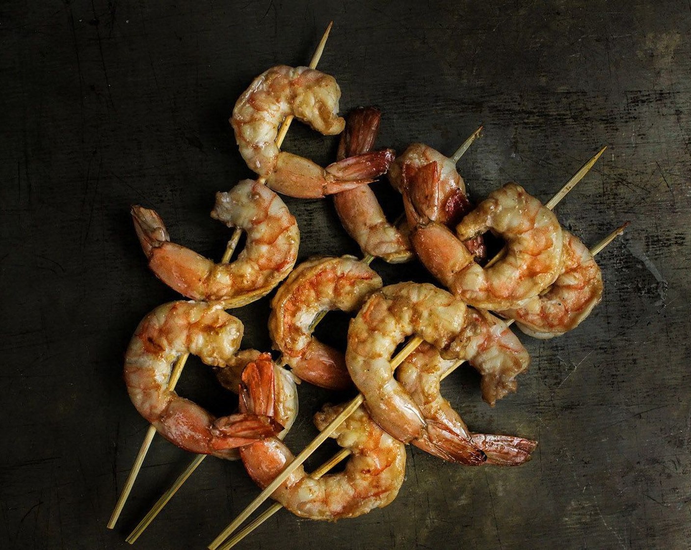 step 7 Set the grill to high heat, and when it has come to temperature, grill the shrimp for 2-3 minutes per side. Add the cooked shrimp skewers to the noodle bowl.