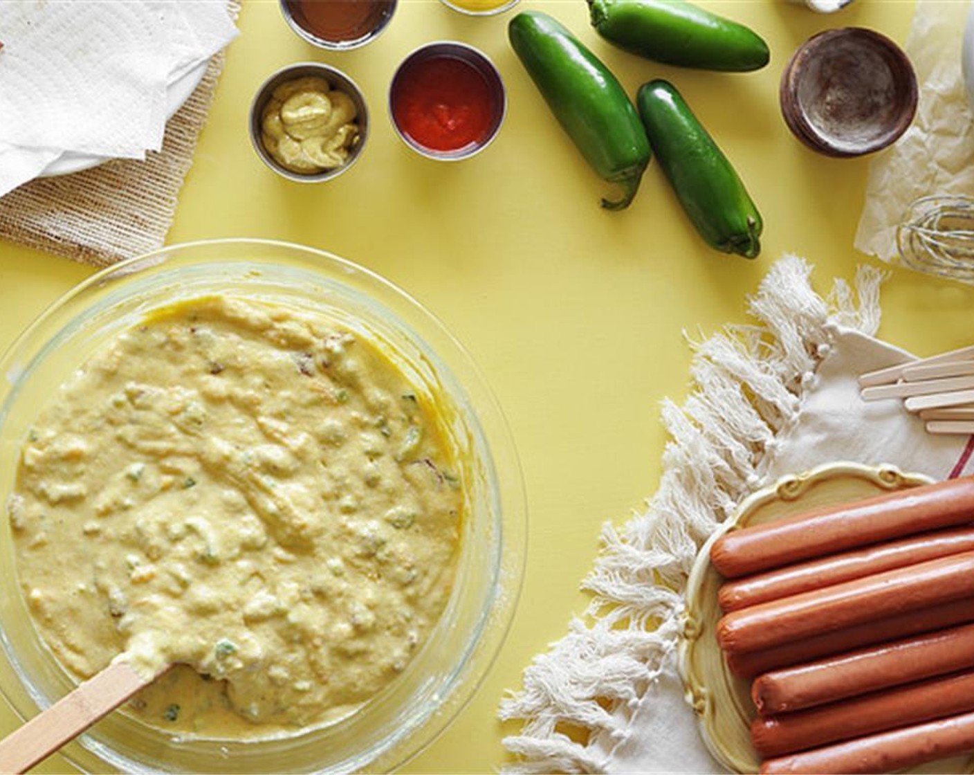 step 3 Mix until evenly combined and smooth. Fold in the Bacon (8 slices), Cheddar Cheese (1 cup), and Jalapeño Peppers (3). Pour the batter into a tall drinking glass.