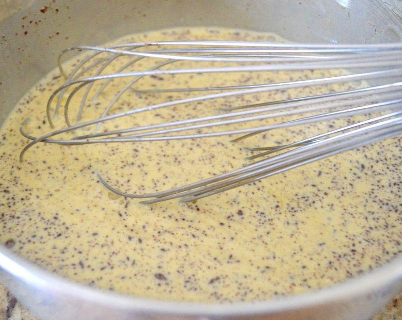 step 3 In a medium bowl, whisk the Eggs (6), Heavy Cream (1 cup), Ground Cinnamon (1 tsp), Ground Ginger (1 tsp), and Vanilla Extract (1/2 tsp) together until smooth.