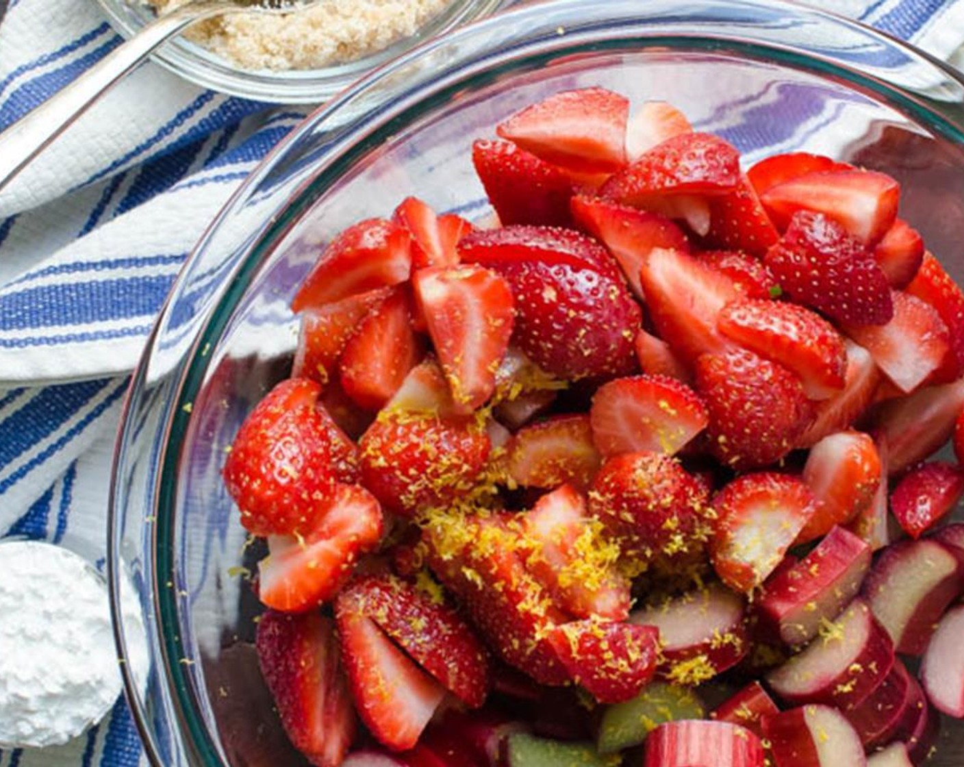 step 2 In a large bowl, combine the Rhubarb (1.5 lb), Fresh Strawberries (4 cups), Brown Sugar (1/4 cup), Granulated Sugar (1/4 cup), Arrowroot Starch (1/4 cup), Salt (1/4 tsp), and zest and juice from Lemon (1). Toss to combine.