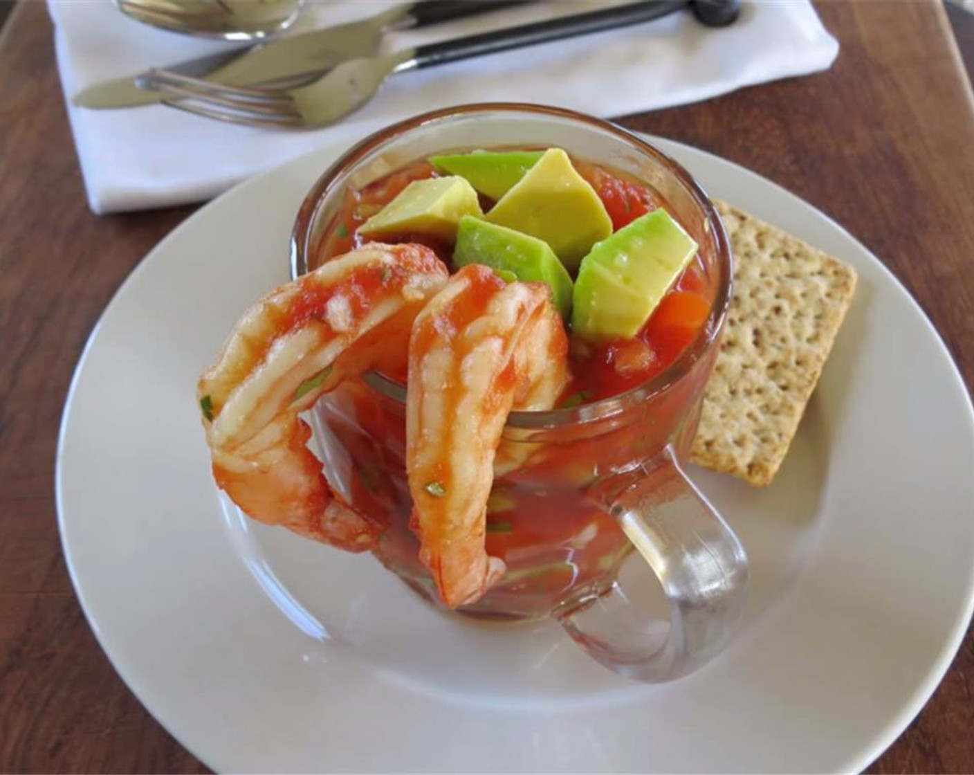 step 9 Chop the Avocados (to taste). Serve shrimp over Tortilla Chips (to taste) and top with avocado. Enjoy!