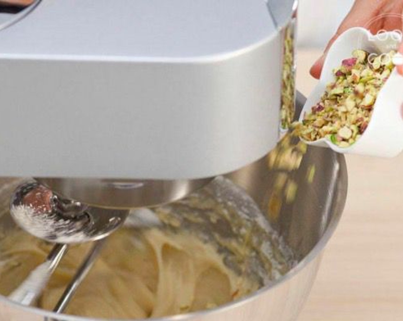 step 8 Add half of the Pistachios (2 tsp) and Almonds (2 tsp) into the mixture.